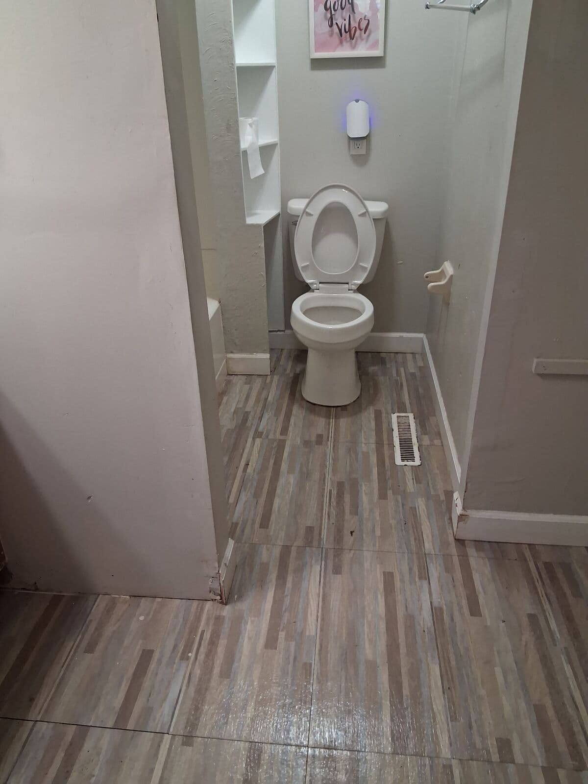 After: Bathroom cleared with clean floor