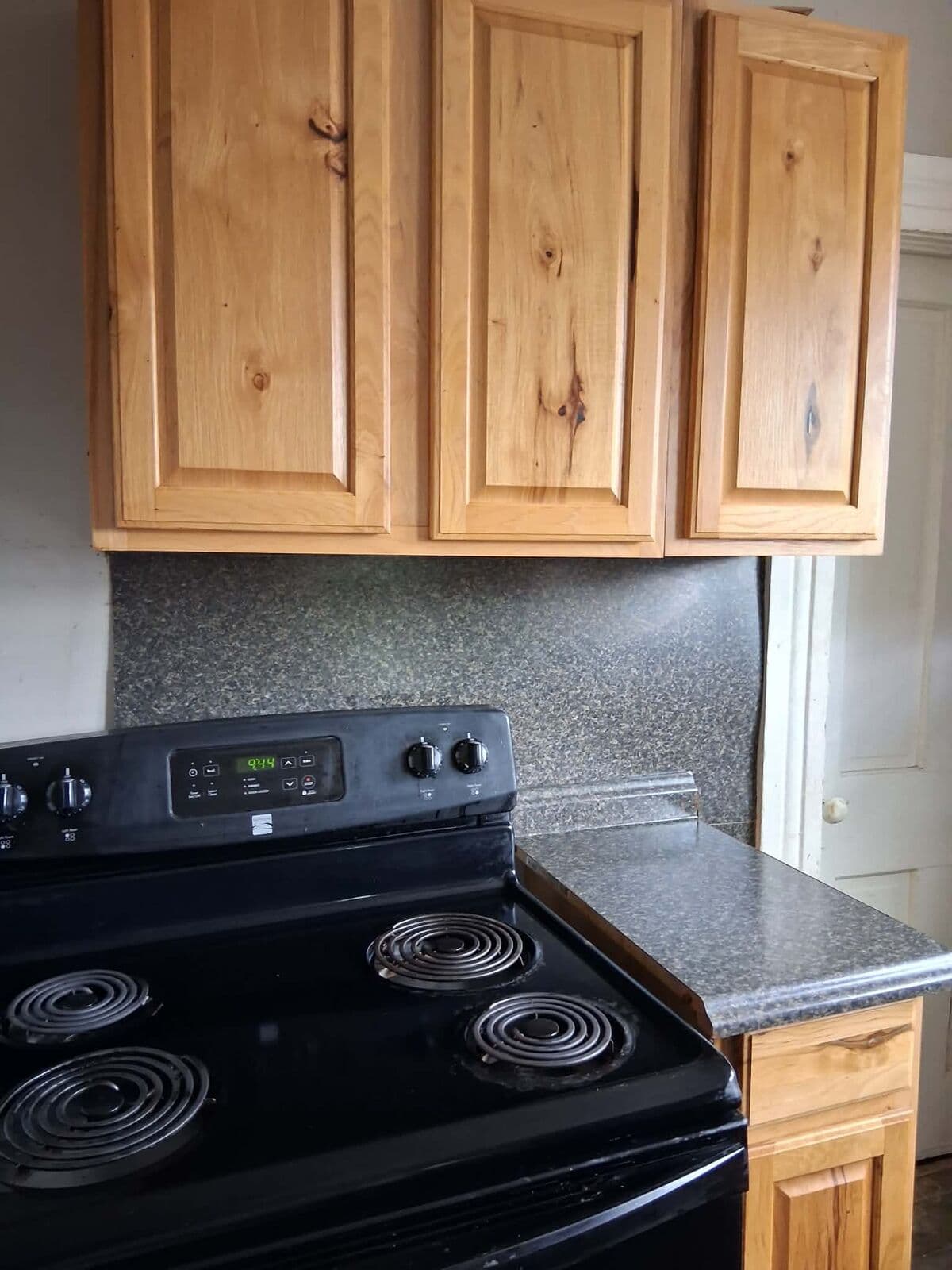 After: Stove top cleaned with cabinets and counter cleared