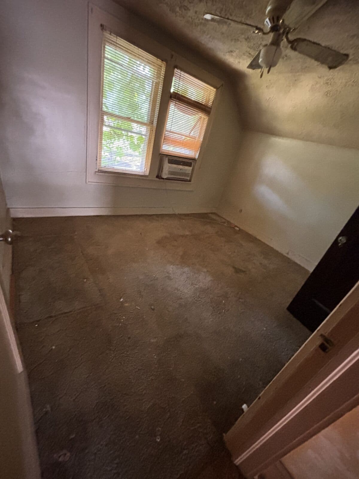 After: Third room emptied down to the floor